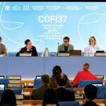 September 7, 2026. Rome, Italy. From left: Manuel Barange, FAO Assistant Director-General, Fisheries and Aquaculture Division (NFI); FAO Director-General QU Dongyu; Chairperson Adam Berry; and Secretary Alice McDonald sit at the start of the 37th Session of COFI—Opening Session. FAO headquarters (Plenary Hall) Photo credit must be given: ©FAO/Pier Paolo Cito.